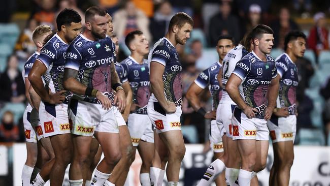 SYDNEY, AUSTRALIA - MAY 20:  Cowboys players look dejected after a Tigers try during the round 12 NRL match between Wests Tigers and North Queensland Cowboys at Leichhardt Oval on May 20, 2023 in Sydney, Australia. (Photo by Matt King/Getty Images)