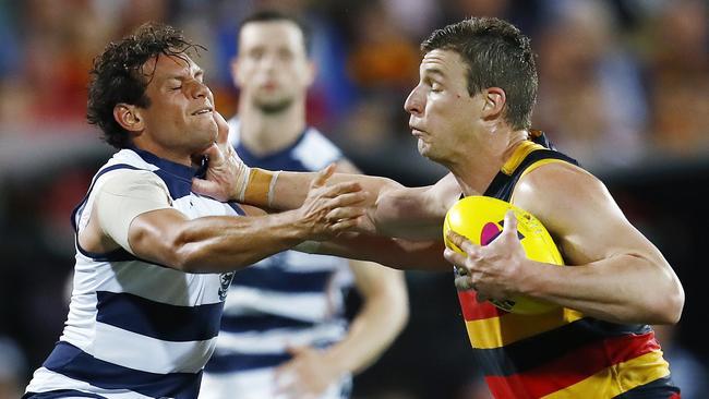 Port Adelaide recruit Steven Motlop tackles Josh Jenkins while playing for Geelong in last year’s preliminary final. Picture: Michael Klein