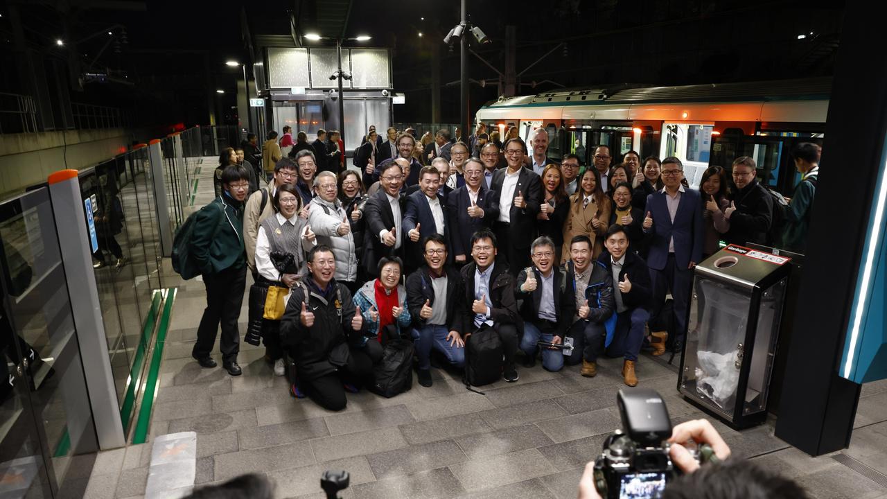 Excited staff and commuters. Picture: Richard Dobson / Newswire