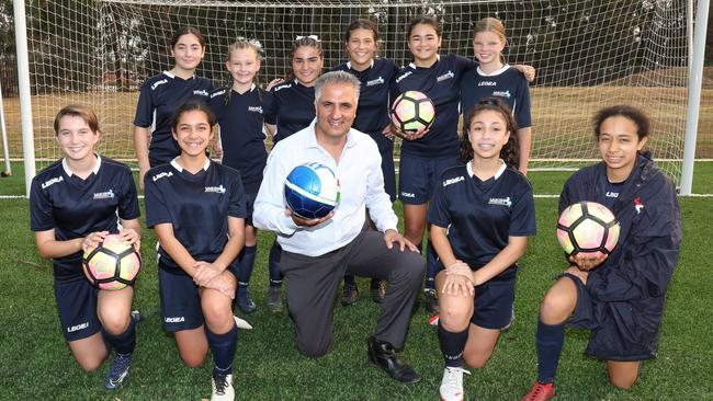 Fairfield City Mayor Frank Carbone trains with the Marconi Stallions FC U-14's girls team in January. Picture: Robert Pozo