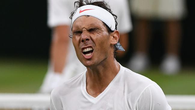 Rafael Nadal has a bit of ground to make up when the match resumes. Picture: AFP.