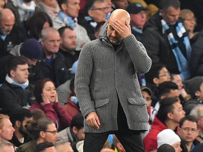 TOPSHOT - Manchester City's Spanish manager Pep Guardiola reacts during the UEFA Champions League quarter final second leg football match between Manchester City and Tottenham Hotspur at the Etihad Stadium in Manchester, north west England on April 17, 2019. - The match ended 4-4, but Tottenham progress to the semi finals on goal difference. (Photo by Anthony Devlin / AFP)