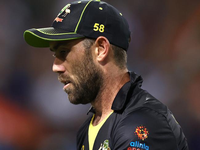 SYDNEY, AUSTRALIA - DECEMBER 06: Glenn Maxwell of Australia watches a six go over his head during game two of the Twenty20 International series between Australia and India at Sydney Cricket Ground on December 06, 2020 in Sydney, Australia. (Photo by Ryan Pierse/Getty Images)