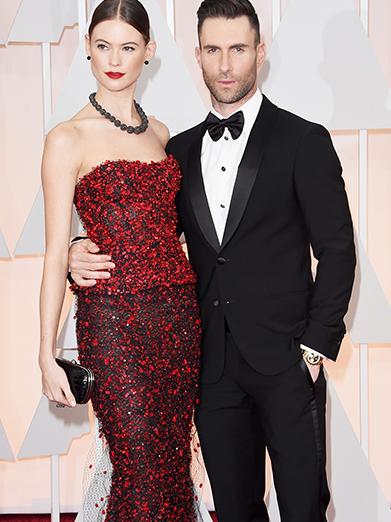 Behati Prinsloo and Adam Levine at the Oscars 2015 red carpet. Picture: Getty