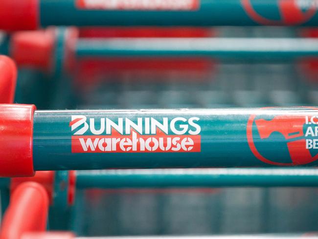 The logo of Wesfarmers Ltd.'s Bunnings Warehouse is displayed on shopping trolleys at a store in Sydney, Australia, on Thursday, July 28, 2011. Revenue at Bunnings, Australia's largest home improvement chain, rose 6.1 percent to A$1.6 billion, Perth-based Wesfarmers said in a statement today. Photographer: Ian Waldie/Bloomberg