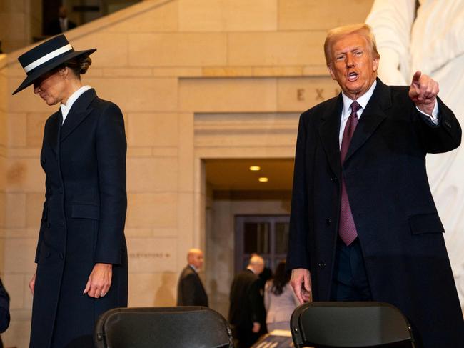 Donald Trump and First Lady Melania Trump depart Emancipation Hall after the President spoke during inauguration ceremonies. Picture: Greg Nash