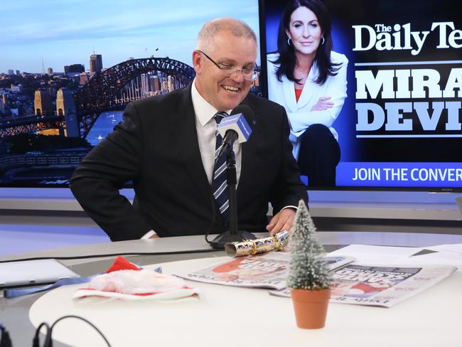 Treasurer Scott Morrison was able to enjoy a festive laugh a few months out of season in yesterday’s podcast session with Miranda Devine. Picture: James Croucher