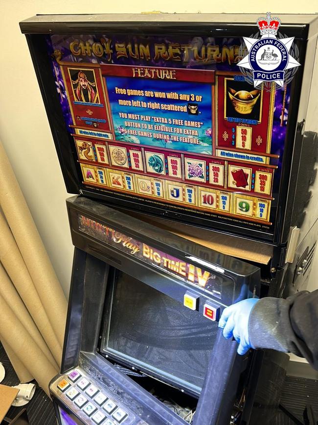 Pokie machines allegedly used to smuggle guns and ammunition. Picture: AFP