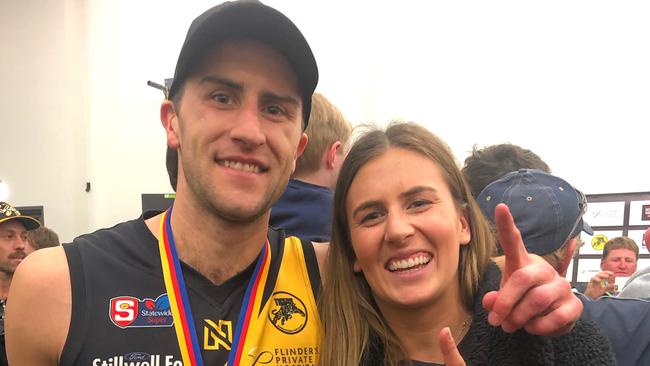 Glenelg player Max Proud with NSW Swifts captain and sister Maddy.