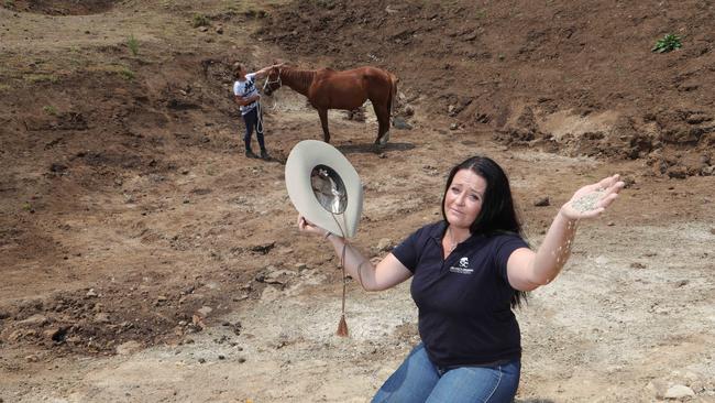 The Tetlow family one of many at Canungra will travel up to 40 minutes each way to get enough water for their animals. Picture: Glenn Hampson.