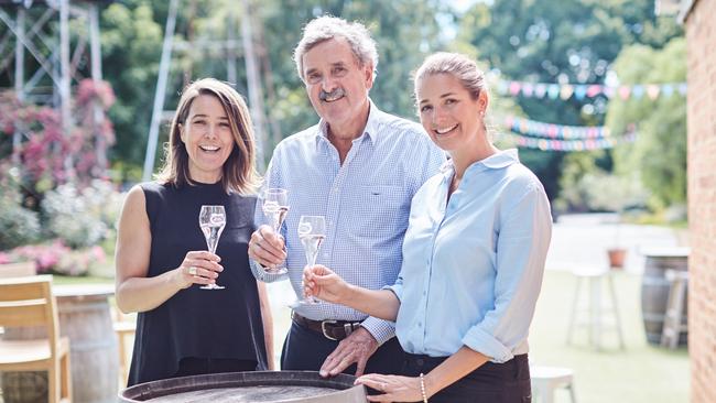 Executive Director of Brown Brothers, Ross Brown, with daughters Caroline and Katherine at the Milawa cellar door.