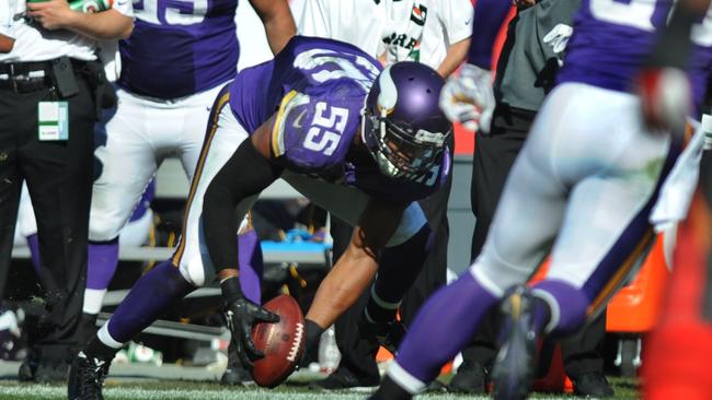 Outside linebacker Anthony Barr recovers the game-losing fumble before running it into the end zone.