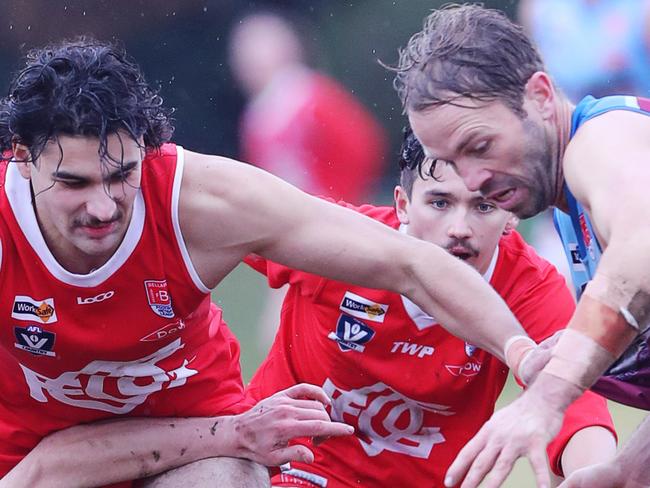 Ocean Grove's James Paterson (5) and Modewarre's Josh Finch (18). BFL: Ocean Grove v Modewarre senior football. Picture: Alan Barber