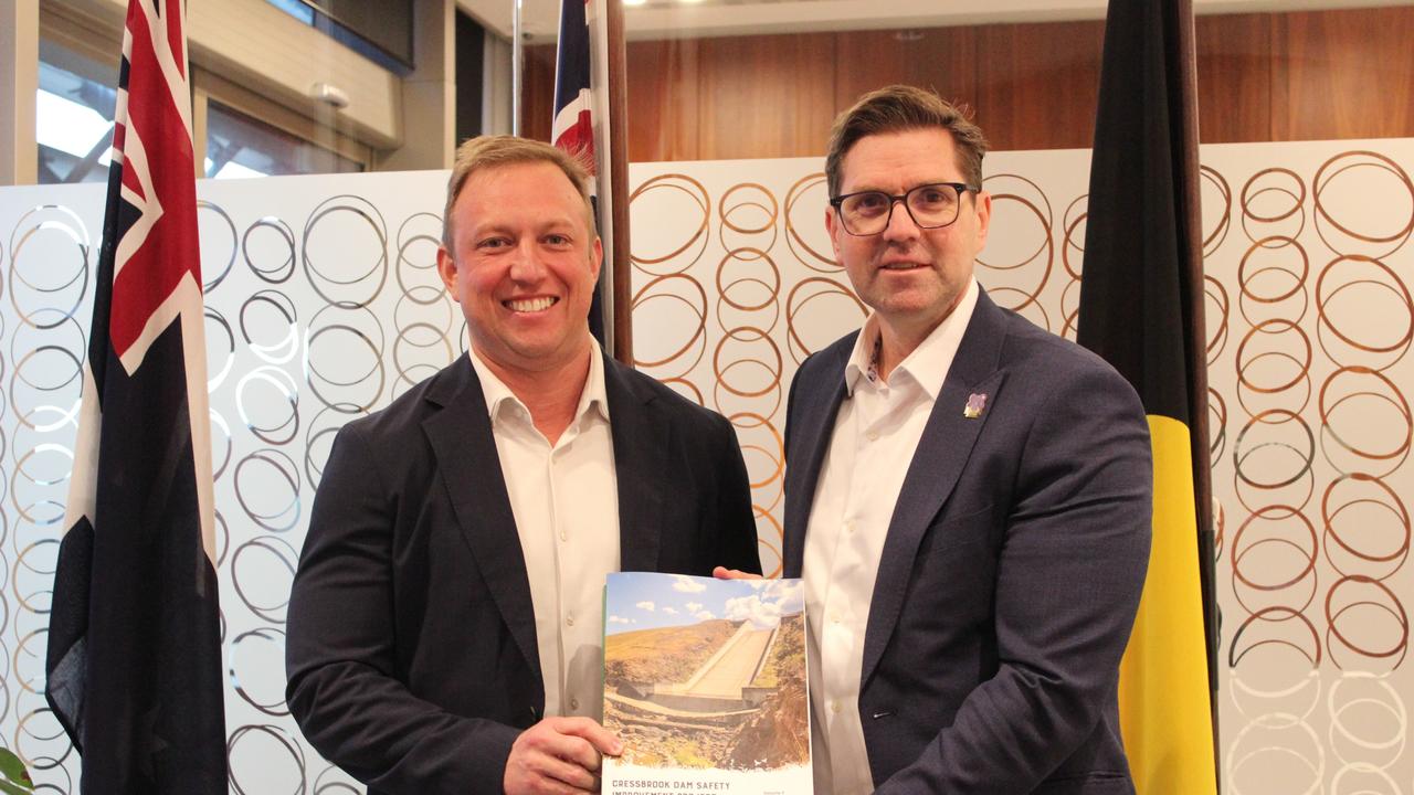 Premier Steve Miles and Toowoomba mayor Geoff McDonald with the council's business case for financial assistance around the $270m Cressbrook Dam safety upgrades.