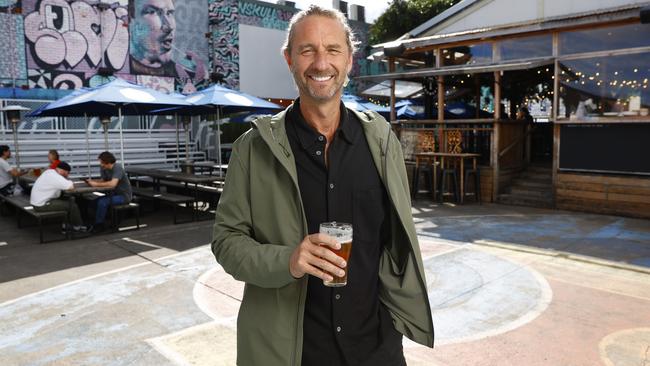 Justin Hemmes in the beer garden at his popular the Vic on the Park, in Marrickville, Sydney. Picture: Richard Dobson