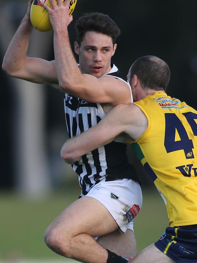 Jed McEntee in action for the Port Magpies after being nabbed in the AFL mid-season draft.