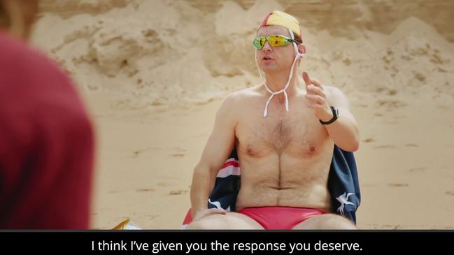 The fake Tony Abbott refuses to help a drowning swimmer in the attack ad.