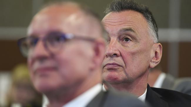 Former Labor MP Craig Emerson, right, and Jay Weatherill listen Mr Albanese speak at the press club. Picture: AAP