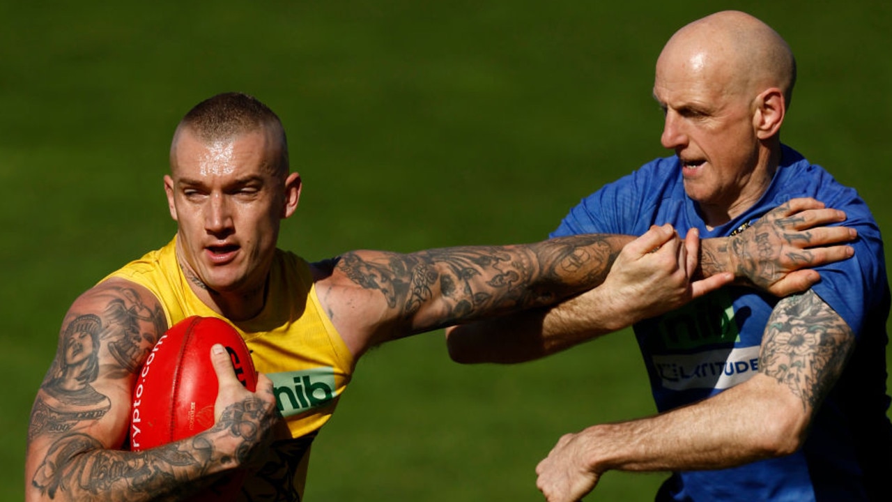 MELBOURNE, AUSTRALIA - AUGUST 27: Dustin Martin of the Tigers takes part in a tackling drill during a Richmond Tigers AFL training session at Punt Road Oval on August 27, 2022 in Melbourne, Australia. (Photo by Darrian Traynor/Getty Images)