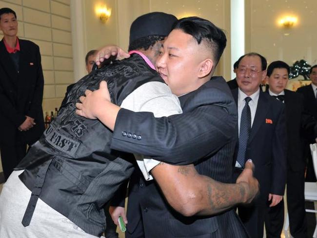 North Korean leader Kim Jong-un hugging former NBA player Dennis Rodman in a 2013 visit. Picture: EPA/KCNA