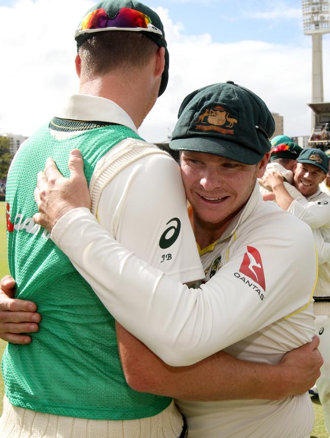 And hugs skipper Steve Smith after the Third Test win. Picture: AAP