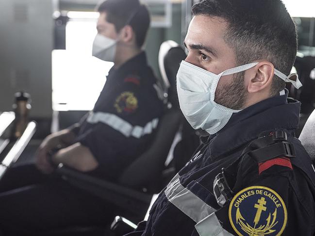 Sailors wear face masks aboard the French aircraft carrier Charles de Gaulle. Picture: AP