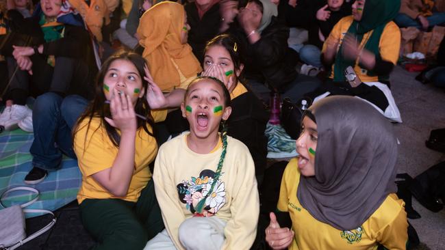 Fans watch on intensely during the WWC semi final at Tumbalong Park. Picture: NCA NewsWire/ Brendan Read