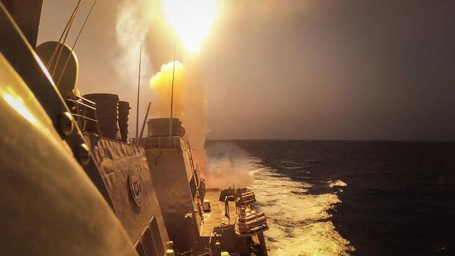 A US Navy guided-missile destroyer, USS Carney, defeats a combination of Houthi missiles and unmanned aerial vehicles in the Red Sea. Picture: Aaron Lau/US Navy/AFP