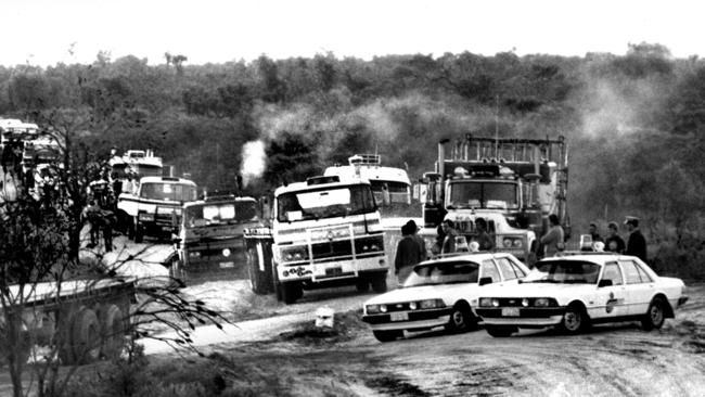 A truck convoy with an oil drilling rig sets off for Noonkanbah, west of Fitzroy Crossing in Kimberley region of Western Australia in 1980, in defiance of local Aborigines who want to protect sacred ground.