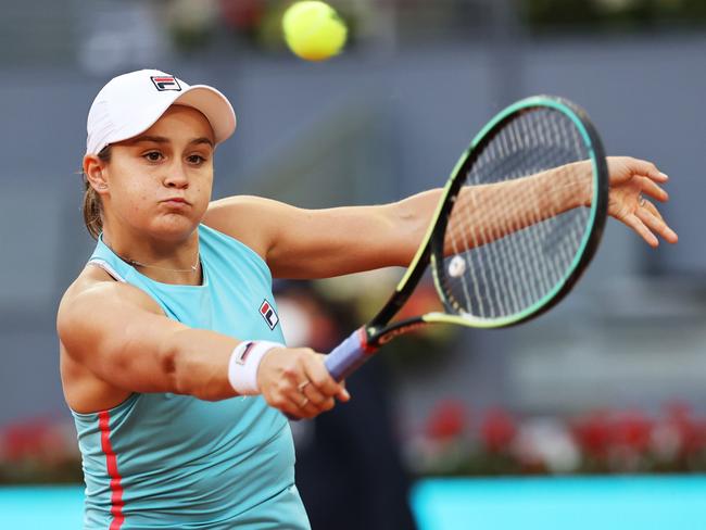 MADRID, SPAIN - MAY 03:  Ashleigh Barty of Australia hits a backhand during her match against Iga Swiatek of Poland at La Caja Magica on May 03, 2021 in Madrid, Spain. (Photo by Clive Brunskill/Getty Images)