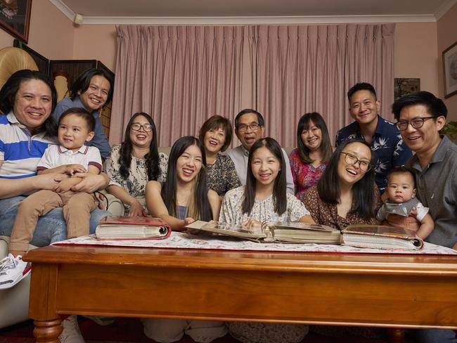 Phi Nguyen, Kendrick Nguyen, 3, Phan Nguyen, Clara Huynh, Elizabeth Nguyen, Huong Nguyen, Catherine Nguyen, 14, Phung Nguyen, Bao Anh Nguyen, Chau Duong, Paxton Nguyen, 8 months, Ty Gaston, Phong Nguyen in the family home in Newton, 3 generations later after the Nguyen family escaped Vietnam by boat 45 years ago, Monday, April 14, 2025. Picture: Matt Loxton