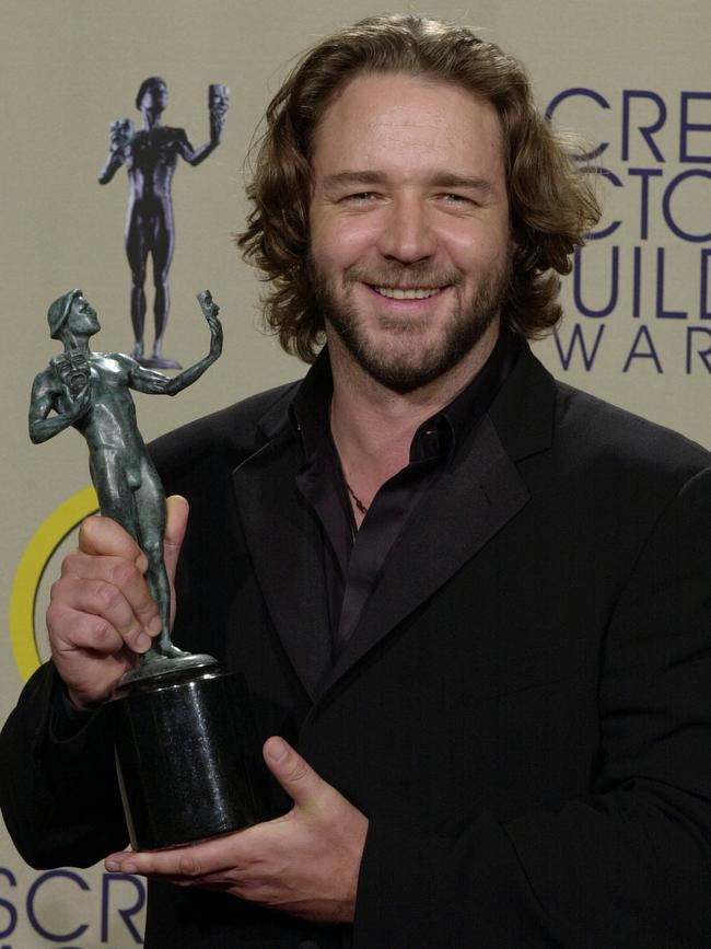 Crowe with his award he won for outstanding performance by male actor in leading role for his work in film "A Beautiful Mind" at 8th annual Screen Actors Guild Awards.