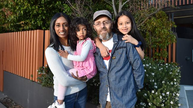 Sean McBride and his wife Jaya and two daughters Kara, 7 and Meera, 3, are about to list their penthouse style home at 307/19 Hall St, Cheltenham. Picture: Nicki Connolly