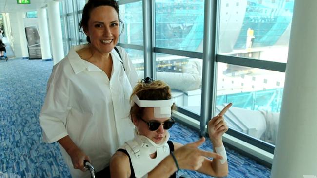 Homeward bound. Adelaide is wheeled toward the plane to Australia. Mum Chantelle also had to leave in a wheelchair. Picture: Sunday Night