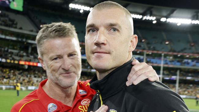 NCA. MELBOURNE, AUSTRALIA. August 24,   2024. AFL Round 24. Richmond vs Gold Coast Suns at the MCG.   Richmonds Dustin Martin  hugs old coach Damien Hardwick on the MCG during his lap of honour   . Pic: Michael Klein