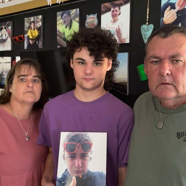 Annette, Tyson and Graeme Kimball with a picture of Ryan, who was killed in a car crash on June 9, 2022. Picture: Supplied