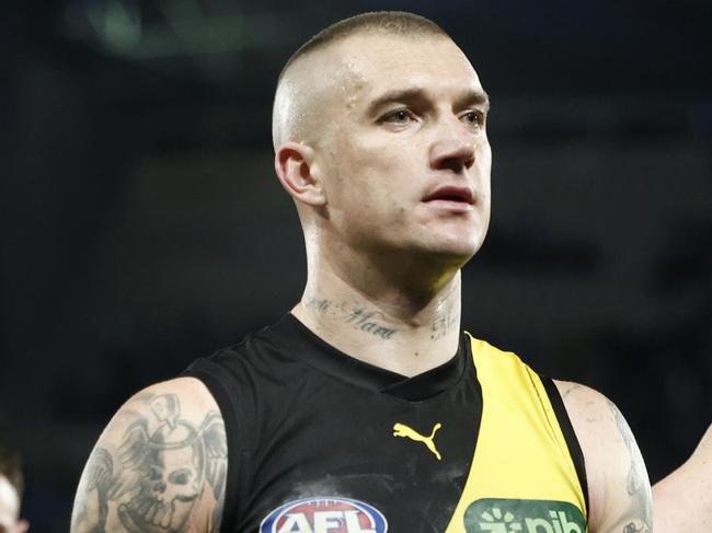 MELBOURNE, AUSTRALIA - AUGUST 03: Noah Balta, Jack Graham, Dustin Martin and Nathan Broad of the Tigers look dejected after the round 21 AFL match between North Melbourne Kangaroos and Richmond Tigers at Marvel Stadium, on August 03, 2024, in Melbourne, Australia. (Photo by Daniel Pockett/Getty Images)