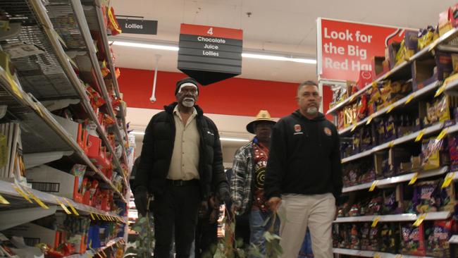 Robin Granites, the grandfather of a 24-year-old man from Yuendumu walks through aisle four in Coles Alice Springs during a vigil for the young man. The young man died in custody inside the supermarket on May 27, 2025, in aisle four, the lolly aisle. Picture: Gera Kazkov