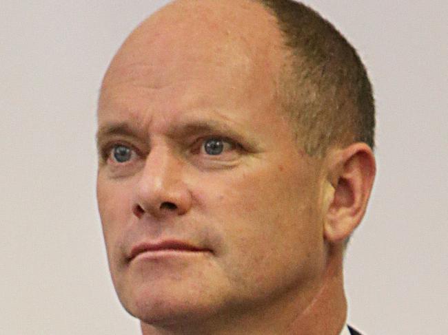 Qld Premier Campbell Newman watches with a cup of tea Treasurer Tim Nichols at State Budget lockup at Parliament. Pic Annette Dew