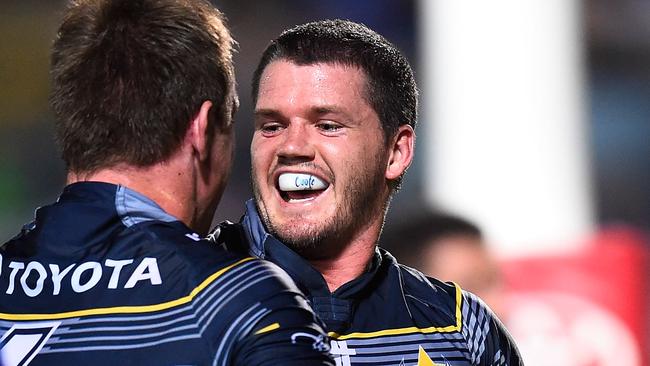 Lachlan Coote of the Cowboys celebrates.