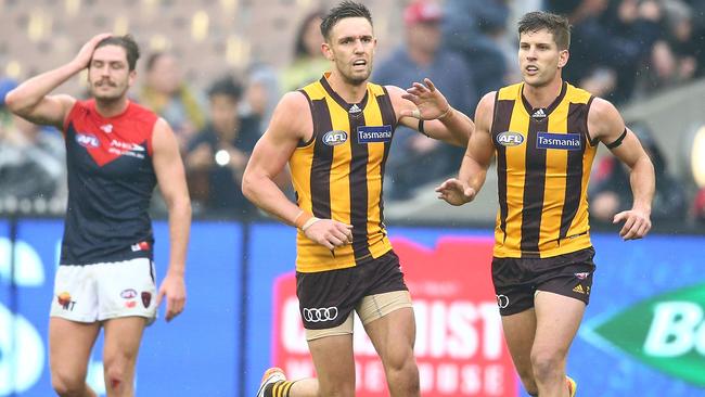 Jack Gunston celebrates a goal with Luke Breust. Picture: Getty