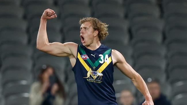 Jed Walter with a big celebration after slotting a goal. Picture: Michael Willson/AFL Photos via Getty Images