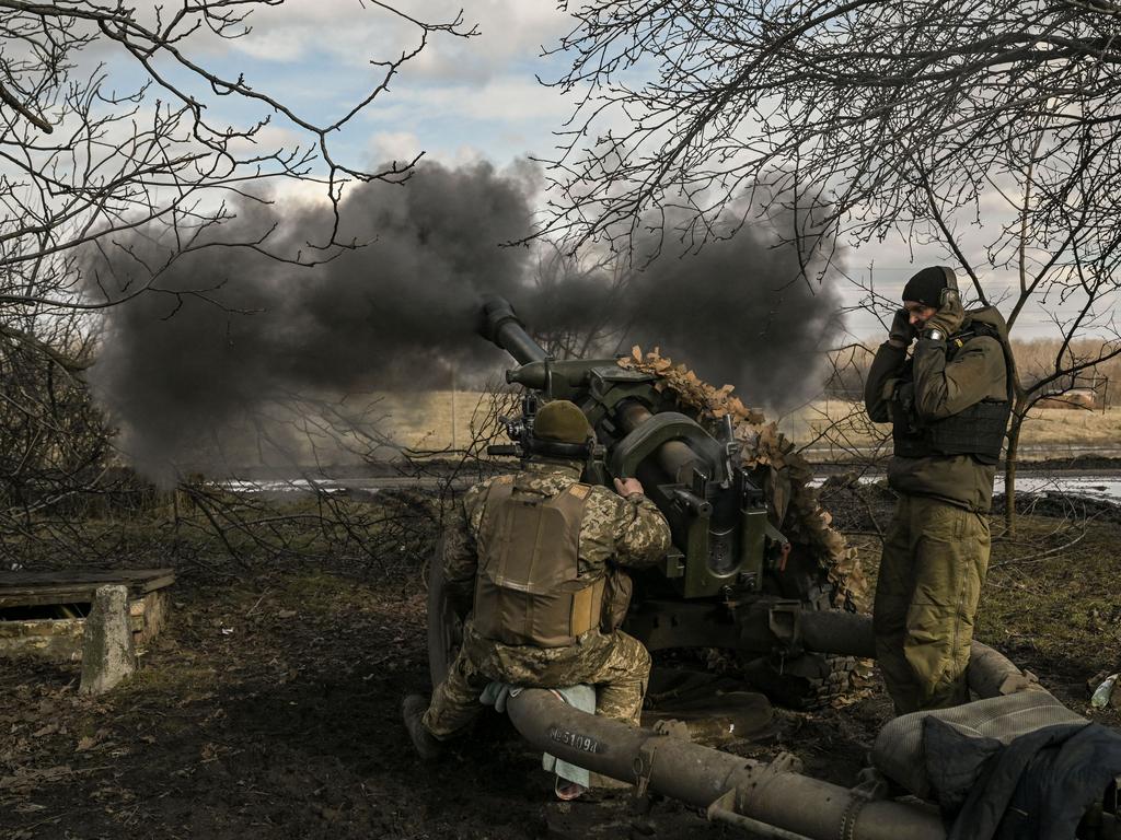 Ukrainian servicemen fire a 105mm Howitzer towards Russian positions, near the city of Bakhmut. Picture: AFP