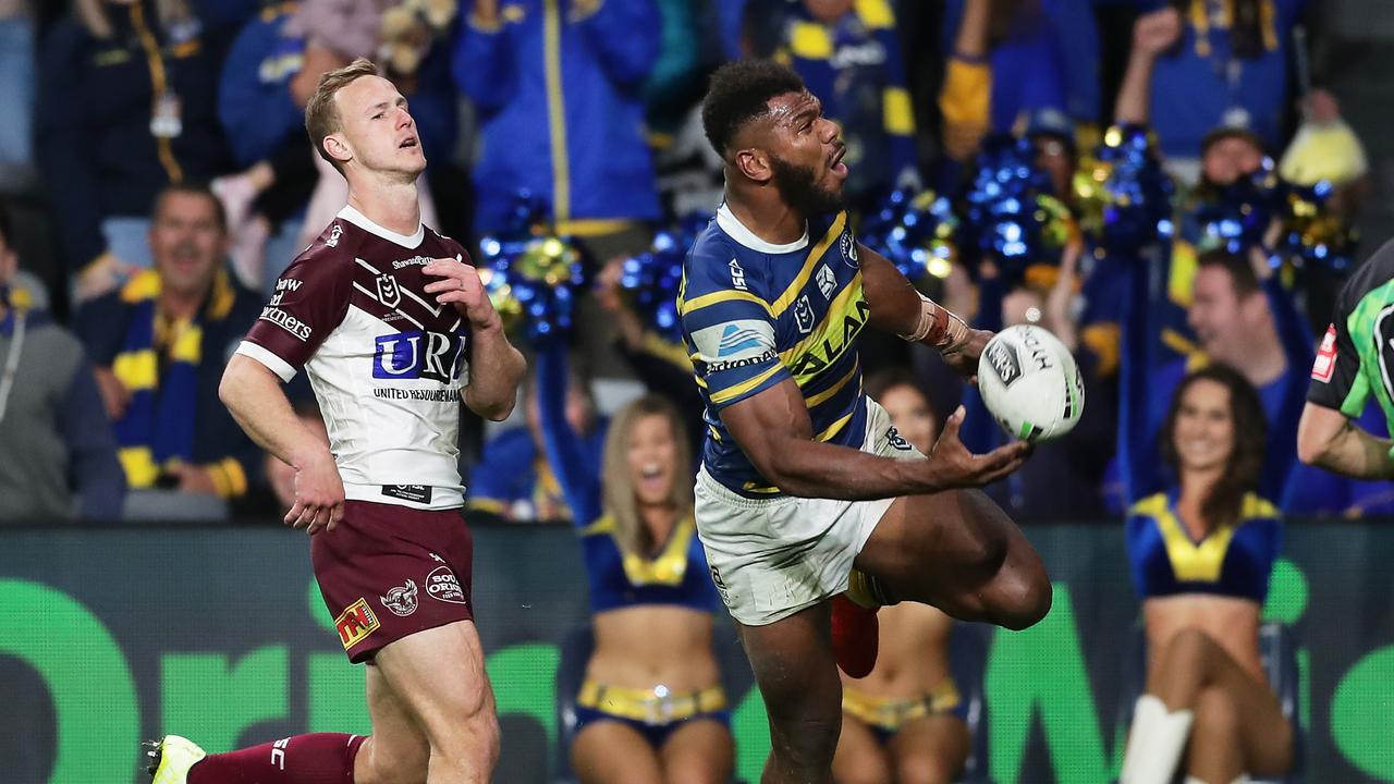 Maika Sivo of the Eels celebrates scoring his third try against Manly