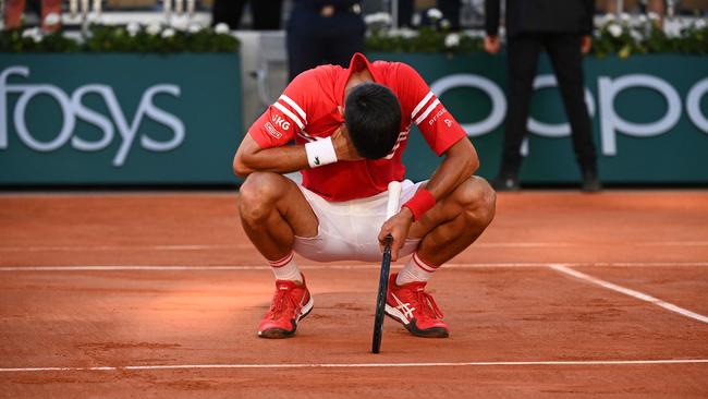 Novak Djokovic reacts after beating Stefanos Tsitsipas to win the 2021 French Open men’s singles title. Picture: AFP