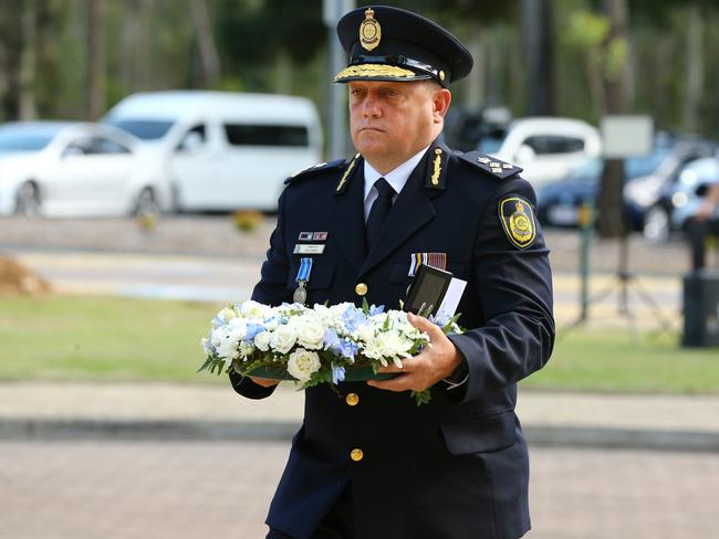Mourners at the memorial service with full police honours for constables Rachel McCrow and Matthew Arnold at Brisbane Entertainment Centre. Picture: David Clark