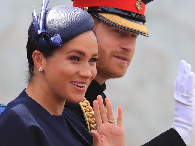 The Duke and Duchess of Sussex make their way along The Mall to Horse Guards Parade, in London, ahead of the Trooping the Colour ceremony, as The Queen celebrates her official birthday.. Picture date: Saturday June 8, 2019. See PA story ROYAL Trooping. Photo credit should read: Gareth Fuller/PA Wire