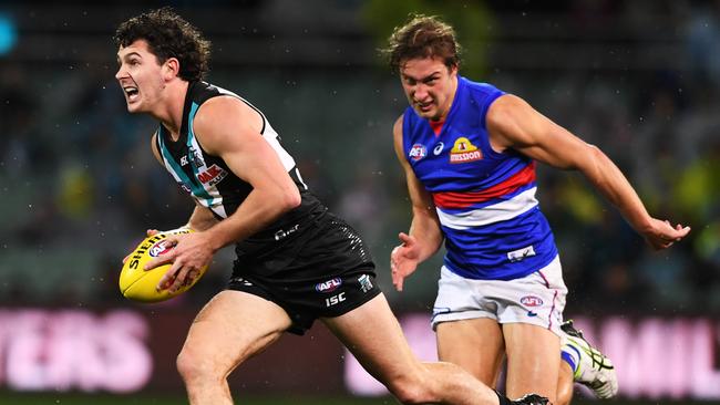 Power defender Darcy Byrne-Jones breaks away against the Bulldogs in Round 15. Picture: Mark Brake/Getty