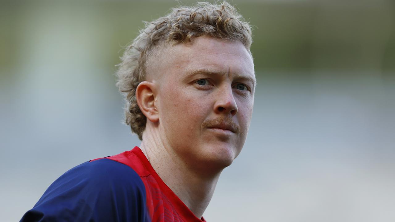 MELBOURNE, AUSTRALIA - MARCH 23: Clayton Oliver of the Demons warms up before the round two AFL match between Hawthorn Hawks and Melbourne Demons at Melbourne Cricket Ground, on March 23, 2024, in Melbourne, Australia. (Photo by Darrian Traynor/Getty Images)