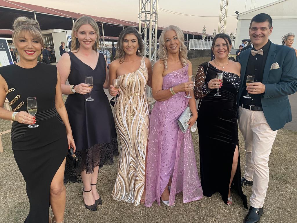 Vera Dukic, Klarin Sivyer, Micaela Langridge, Jo Norton, Sara Braines-Mead and David Braines-Mead enjoy the 2022 Darwin Cup Gala Ball. Picture: NT News